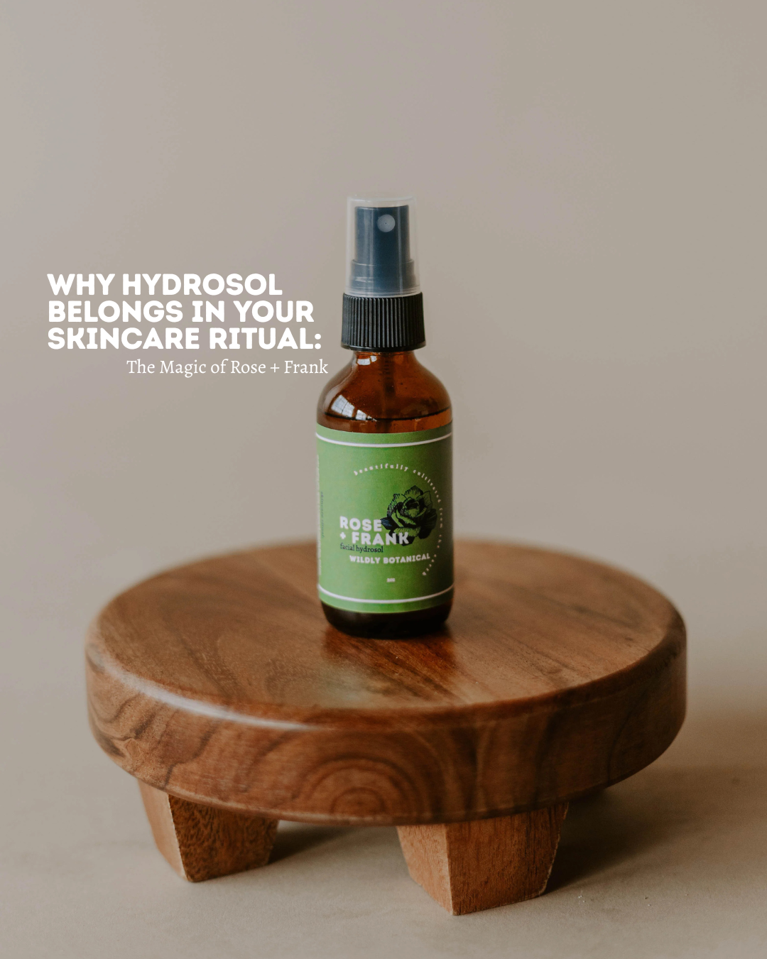 rose and frank hydrosol with a green label on a wooden stand
