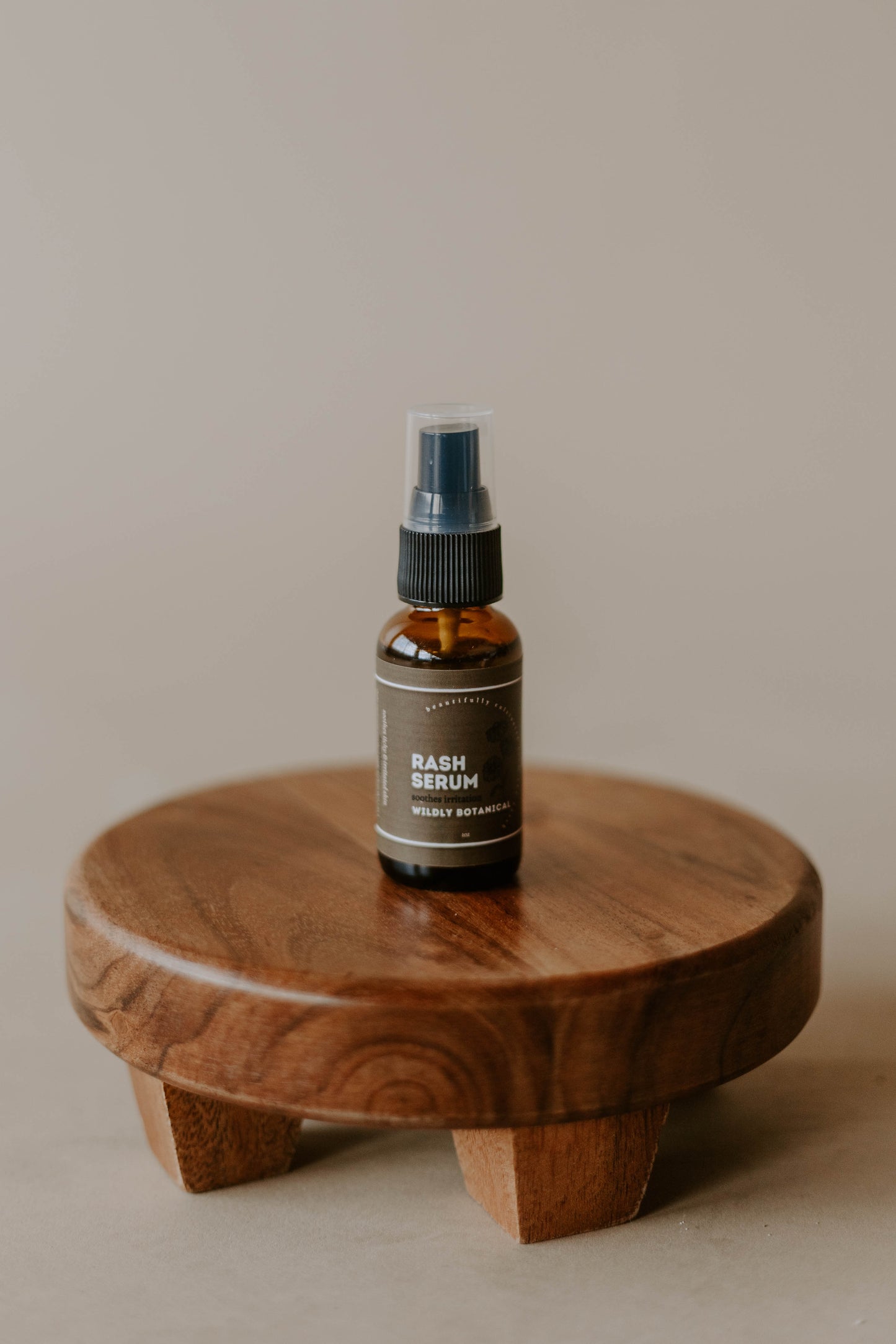 rash serum, rash, skincare, eczema, psoriasis, wooden stand