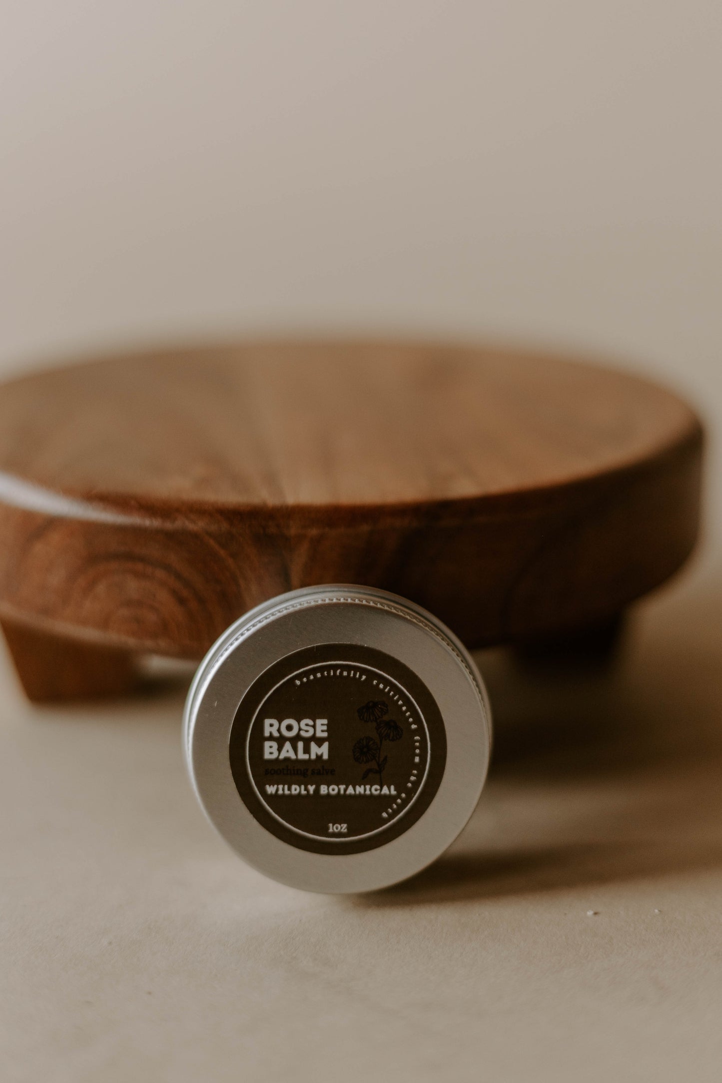 rose balm, salve, tin, repairing, rose, wooden stand