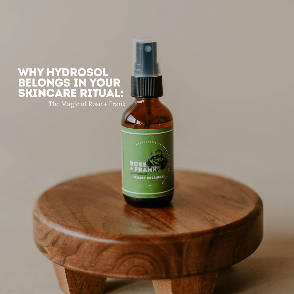 rose and frank hydrosol with a green label on a wooden stand